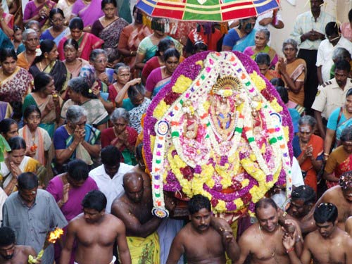 Goddess Parvati presents the Vel (lance) to her youngest son Lord Murugan as her power and energy according to Hindu mythology.