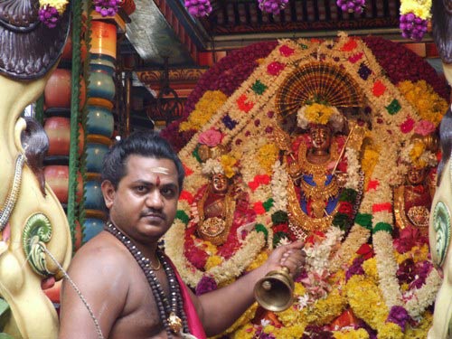 The main priest of the temple Sri Sivanesa Kurukkal (Palani Kurukkal) accompanied the statues on procession.