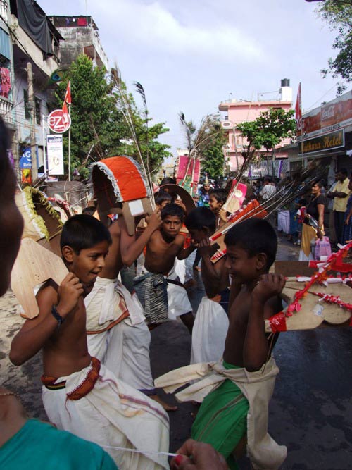 Young devotees perform Kavadi dance.