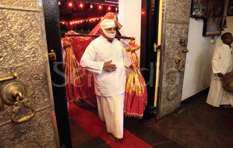 Bringing in the muluthan pooja for Lord Murugan in the Muluthan Kanda