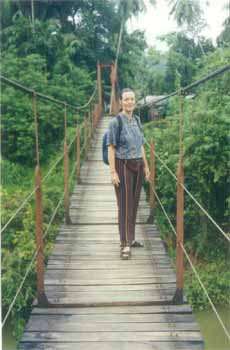 The author on a bridge leading to town