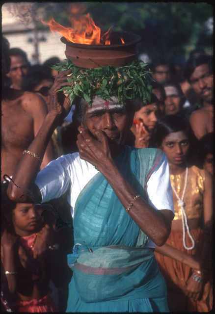 Devotee with  burning camphor